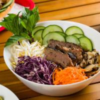 Smoked Brisket Vermicelli Bowl · Vermicelli noodles, pickled carrots, cucumbers, thai basil, bean sprouts, red cabbage, and s...