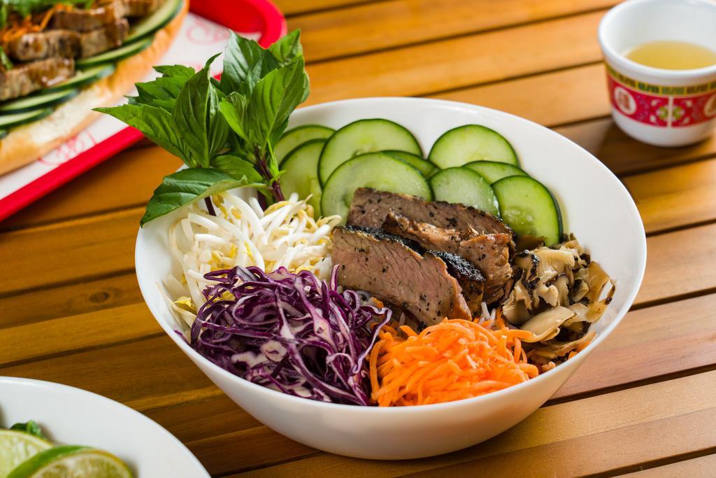 Smoked Brisket Vermicelli Bowl · Vermicelli noodles, pickled carrots, cucumbers, thai basil, bean sprouts, red cabbage, and shiitake mushrooms. Served with house fish sauce on the side.