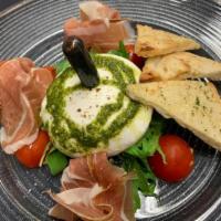 BURRATA · Served with arugula salad, prosciutto, pesto, Modena balsamic and focaccia