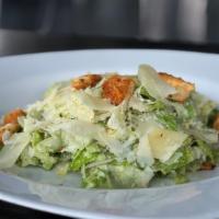 CESARE · Romaine Lettuce, shaved Parmesan cheese, croutons and homemade Caesar dressing