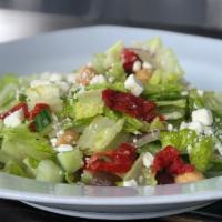 MEDITERRANEAN · Cucumber, olives, garbanzos, feta cheese, red onions, sundried tomatoes over romaine lettuce...