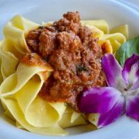 PAPPARDELLE · Braised lamb ragout in Barolo wine sauce
