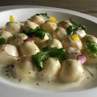 GNOCCHI ASIAGO · Homemade potato gnocchi, stuffed with Asiago cheese, served in a four-cheese sauce, with cri...