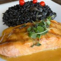 SALMON  · Passion fruit sauce, served with Squid ink risotto