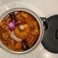 SEAFOOD CASSEROLE · Lobster, shrimps, clams, mussels, calamari, Jasmine rice in saffron lobster bisque