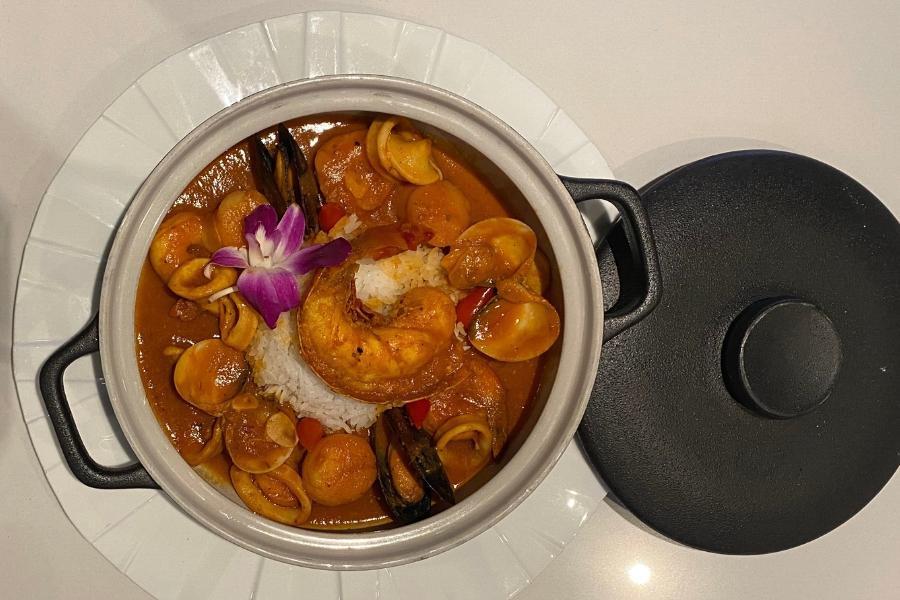 SEAFOOD CASSEROLE · Lobster, shrimps, clams, mussels, calamari, Jasmine rice in saffron lobster bisque