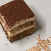 TIRAMISU · Vanilla sponge layered with espresso, mascarpone cheese, rum and cocoa
