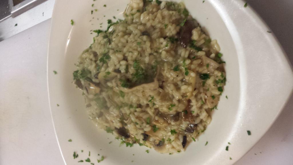 Risotto al Funghi · A combination of sauteed mixed mushrooms in an extra virgin olive oil and garlic.