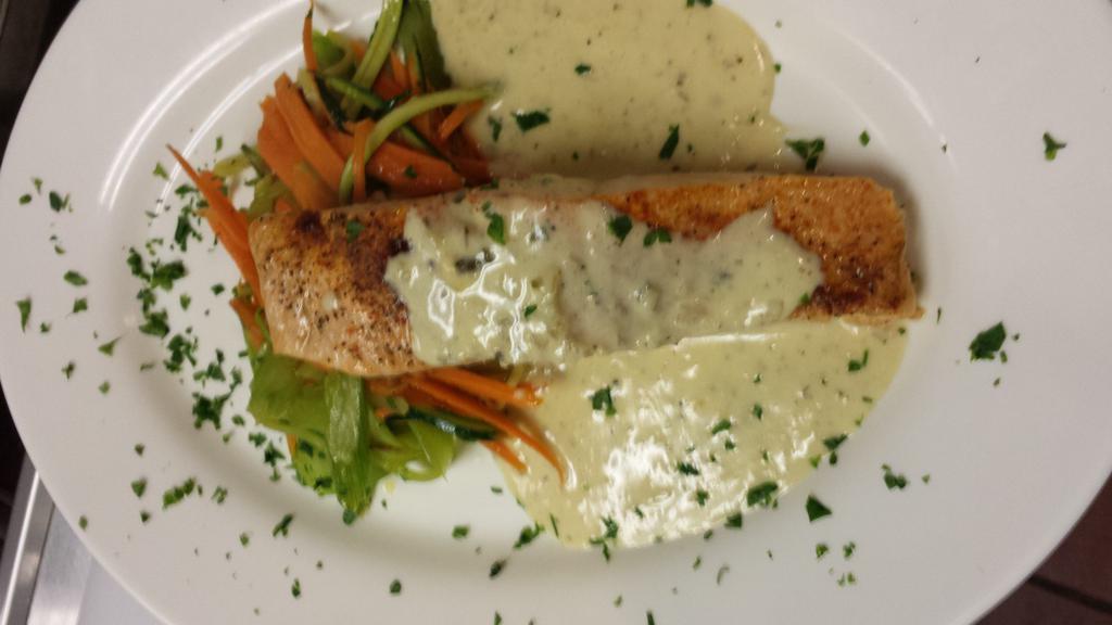 Salmone alla Griglia · Chef specialty. Grilled salmon with our Dijon sauce over vegetables.
