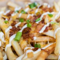 Bacon Cheese Fries · Includes Bacon, Shredded Cheddar Jack Cheese