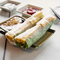 1V. Goi Cuon Chay (2) · Fresh springrolls wrapped with tofu. Dipping sauce is topped with peanuts.