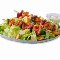 Caesar Salad with Grilled Shrimp Kebob · Caesar Salad topped with Shrimp Kebobs