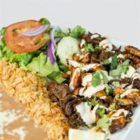 Cielo Mar y Tierra House Special · Grilled steak, chicken and buttery shrimp soaked in our herbs and our spicy house sauce.