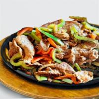 Fajitas House Special · Your choice of steak or chicken grilled and tossed in fresh bell peppers, tomatoes, onions, ...