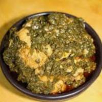Palak Chicken · Marinated chicken with spinach and cream based curry  sauce. Served with basmati rice. GLUTE...