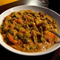 Vegetable Korma · Vegetable sauted in rich cashew sauce, garlic-ginger and onion sauce. Served with basmati ri...