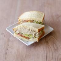 06. Tuna Salad Sandwich · Includes: mustard, mayo, lettuce, tomato, pickles, and onions
