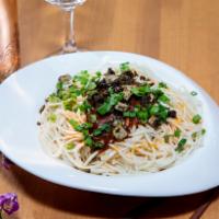 8. Dan Dan Noodle · Thin wheat noodles with chili oil, garlic, and sesame sauce, topped with tofu and scallions