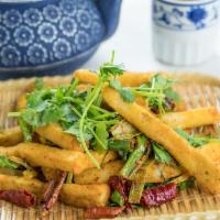 14. Dry Fried Eggplant · Deep-fried eggplant frites seasoned with cilantro, scallions, Szechuan spices, and dried chi...