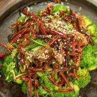 52. Mongolian Beef · Slices of flank steak marinated in a lightly spiced brown sauce and stir-fried together with...