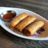 Thai Spring Roll · Hand-roll with cabbage, silk noodles, carrot and Thai sweet chili dipping sauce.