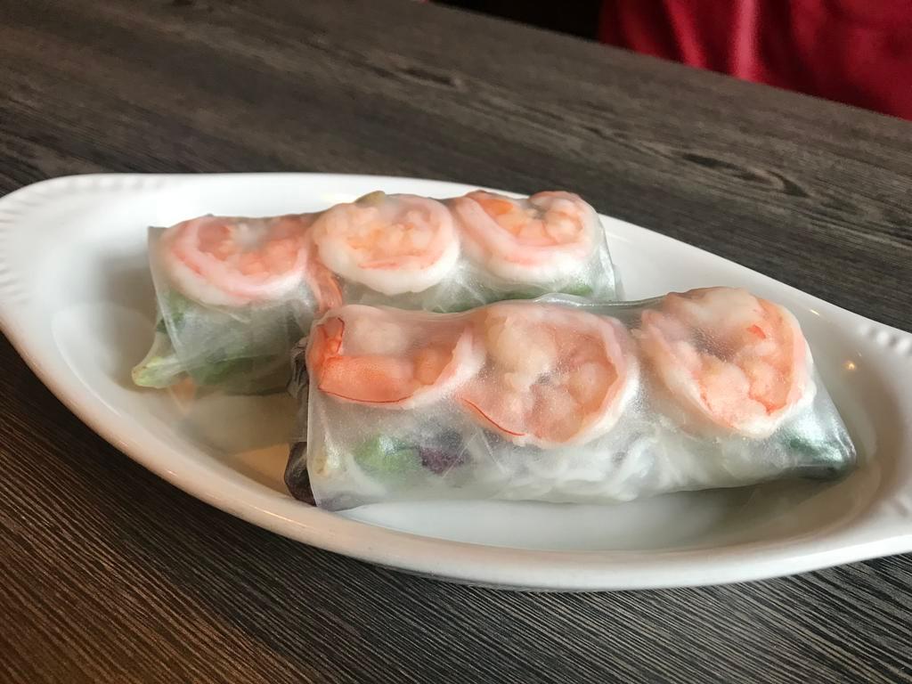 Fresh Spring Roll · Greens, shrimp and rice noodle served with peanut sauce.