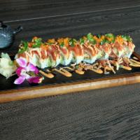 Firecracker Roll · Fresh. Inside: tempura shrimp and avocado. Outside: spicy tuna, tempura kani, jalapeno, scal...
