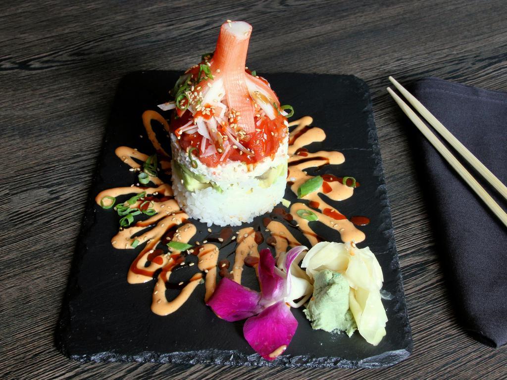Kyoto Pagoda · Fresh. Layer of rice, avocado, crab mix and choice of protein, crab stick, spicy mayo, tobiko and eel sauce.