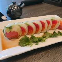 Naruto Roll · Fresh. Inside: chef's choice sashimi, avocado and kani. Outside: wrapped in cucumber and pon...
