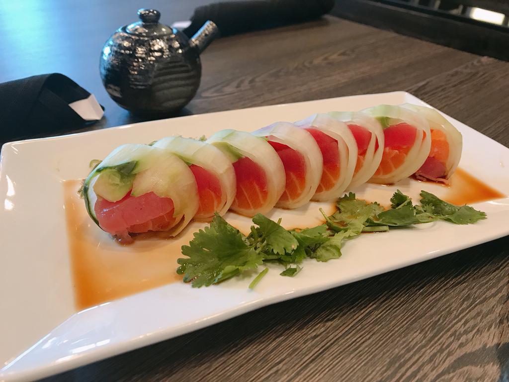 Naruto Roll · Fresh. Inside: chef's choice sashimi, avocado and kani. Outside: wrapped in cucumber and ponzu sauce.