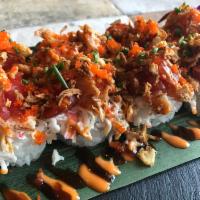The Great Wall Roll · Inside: Tempura shrimp, jalapeno. Outside: Crawfish, spicy tuna, crab mix, fried onion, scal...