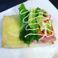 Ham and Cheese Sub Sandwich · Ham, cheese, lettuce, tomatoes and onions.