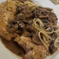 Marsala Chicken · A classic dish with mushrooms and Marsala wine served with linguine.