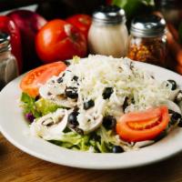 Antipasto Salad · Ham, salami, provolone, mozzarella, tomato, and olives on romaine lettuce. Served with bread.
