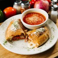 Country Calzone · Smoked sausage, house-shredded mozzarella, and ricotta cheese with a side of marinara 