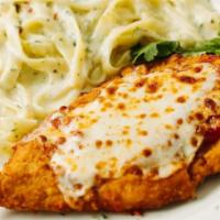 Italian Duo Parmigiana · Our most popular dish! Seasoned and breaded chicken cutlet topped with tomato sauce, house-s...