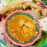 Roti Dip Curry  · Pan-seared Roti (bread) with yellow curry dipping sauces.(Choice of Chicken Or Vegetable)