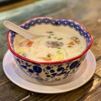 Tom Kha Soup · Coconut milk soup, onion, mushroom and tomato.
