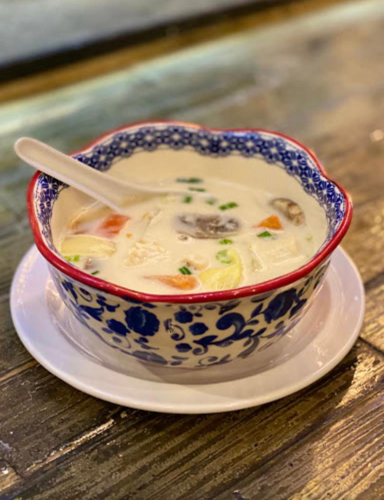 Tom Kha Soup · Coconut milk soup, onion, mushroom and tomato.