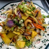 Mango Salad · Fresh Mango, chili, red onion, scallions, cashew nuts, carrots and lettuce tossed in a refre...