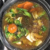 Lard Nah · Flat rice noodles in gravy soup with Chinese broccoli and mushroom.