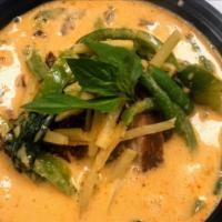 Red Curry (medium spicy) · Medium spice with  bell pepper, bamboo shoot, string bean and basil.