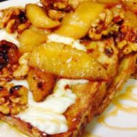 Caramel Apple French Toast · Three slices of Texas toast topped with caramelized cinnamon apples.