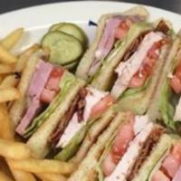 Club Sandwich · Your choice of sliced turkey breast or ham triple-stacked with bacon, lettuce, tomatoes and ...
