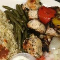 Chicken Kabob · Tender cubes of chicken marinated in our special Greek seasonings with green peppers and oni...