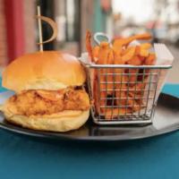 Louisiana Buttermilk Fried Chicken Sandwich · cabbage slaw and tangy iNINE sauce.
