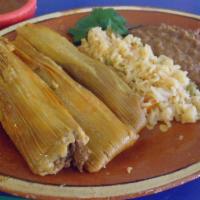 Three Pork Tamales Plate · Three Pork Tamales with a side of Rice and Beans.
