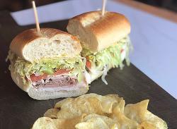 Roast Beef & Provolone Sandwich (Half) · With soup or salad. Roast beef, provolone, lettuce, tomato, onion, mayo, red wine vinegar and olive oil.