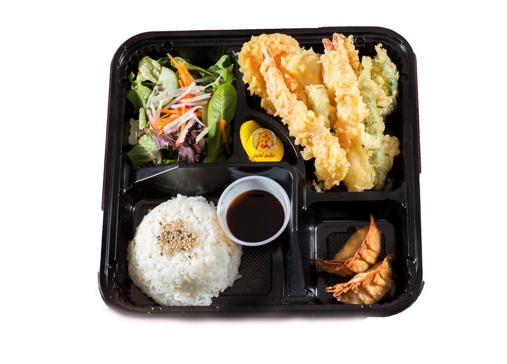 Shrimp Tempura Bento · 2 pcs shrimp  and assorted vegetables tempura, 2 pcs of fried chicken gyoza, green salad with ginger dressing, steam rice and served with miso soup.