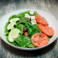 Spinach Salad · Spinach, cucumber, feta cheese, Kalamata olives, Pepperoncini. Served with House dressing an...